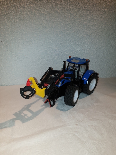 Holzgreifer für Frontlader mit Wechselrahmen lackiert